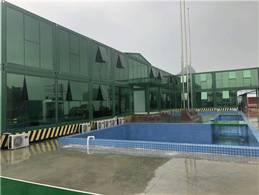 Edificios de oficinas de pared de vidrio casa de contenedor verde de lujo